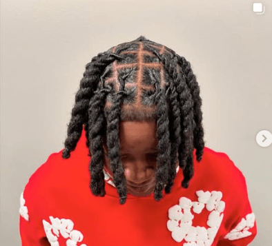 Teen locs with clean parts and professional styling